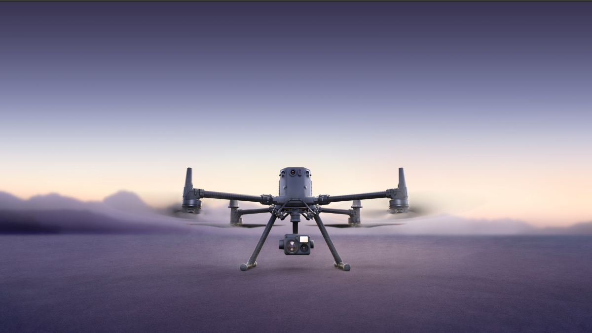 DJI Matrice enterprise drone in flight against sunset sky